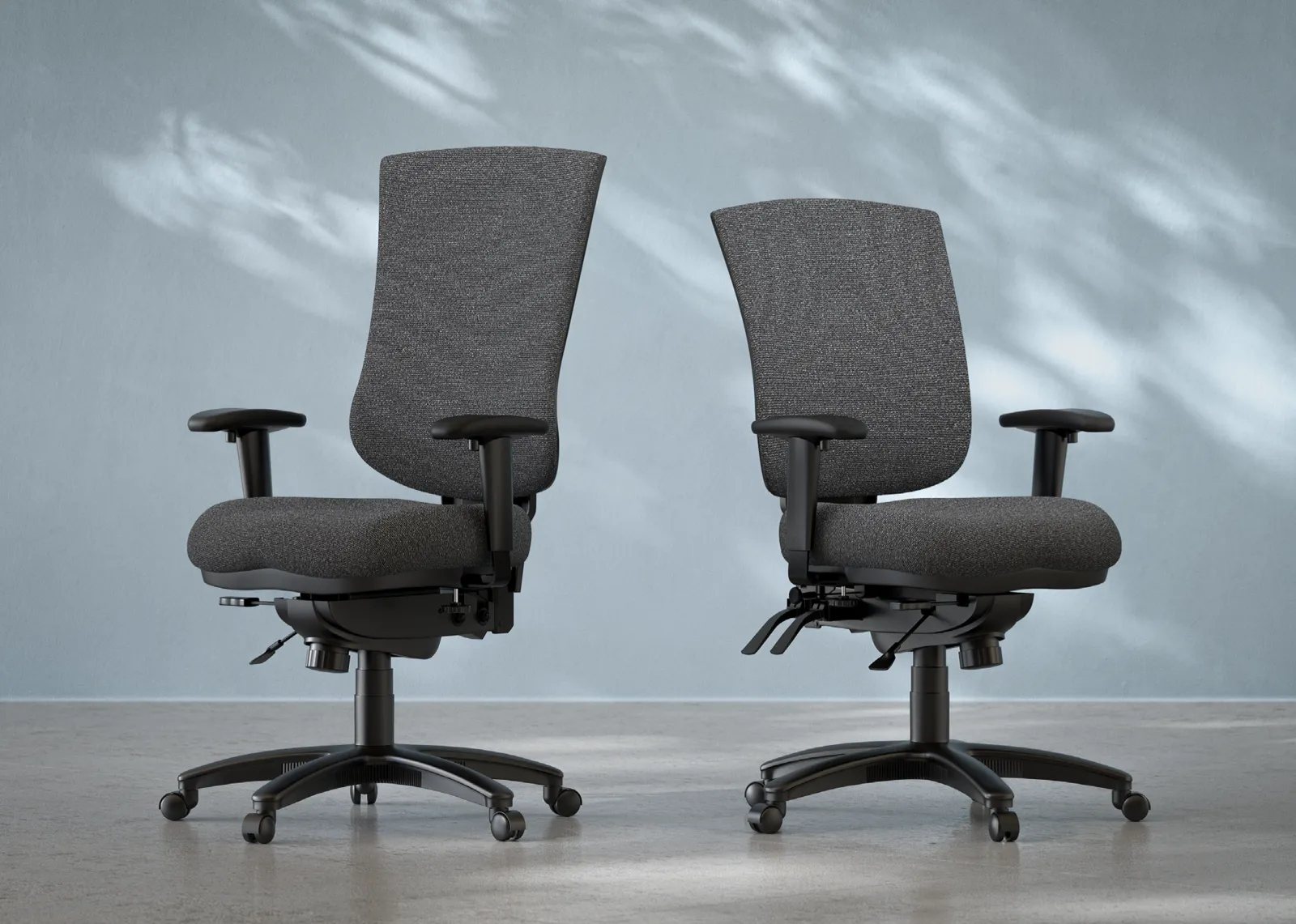 Pair of ergonomic office chairs for a professional workspace
